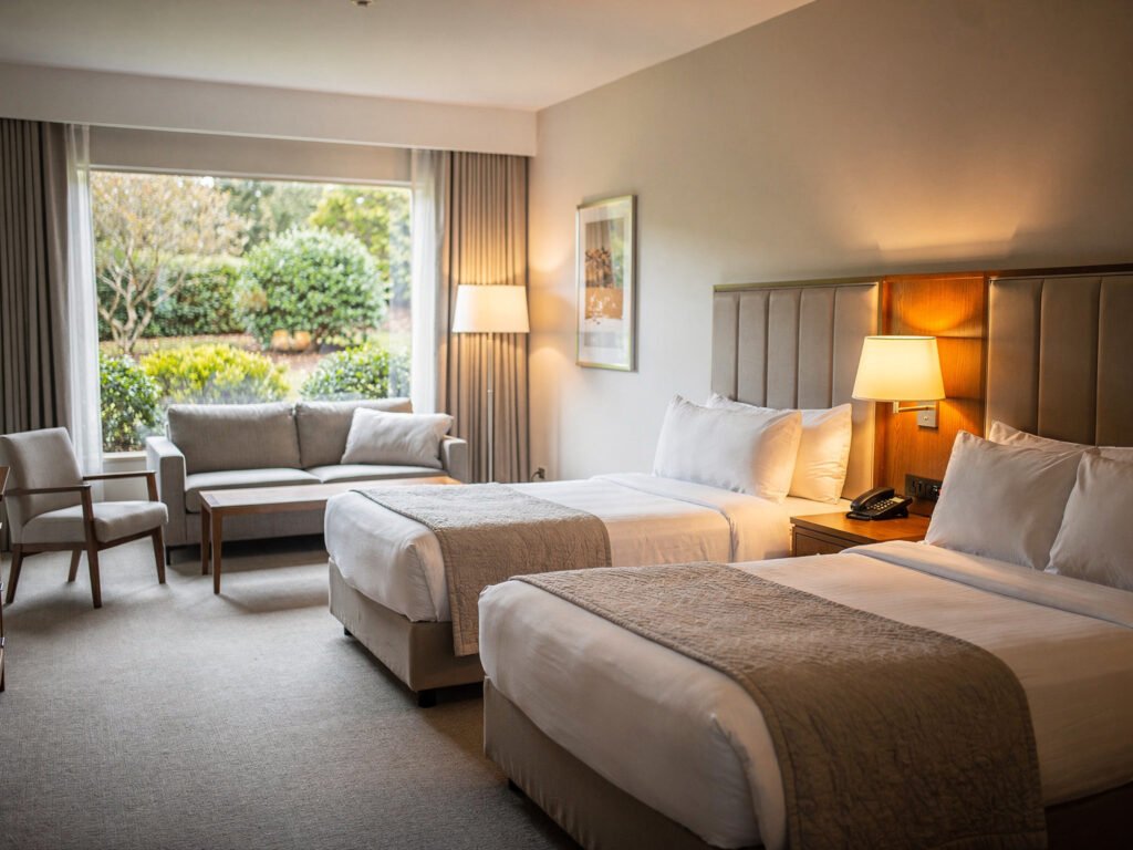 Family suite with two queen beds (illustrative)